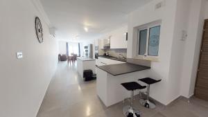 Kjøkken eller kjøkkenkrok på Modern 3-bedroom apartment Pieta