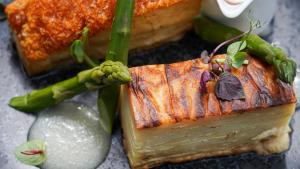 a close up of a piece of food with asparagus at The Fishbourne in Fishbourne