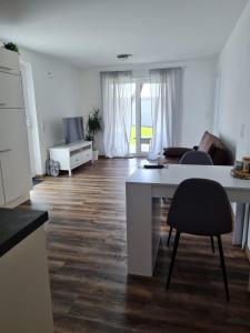 TV a/nebo společenská místnost v ubytování Ferienwohnung Allgäu