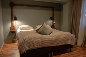 Postel nebo postele na pokoji v ubytování Canyon Hotell
