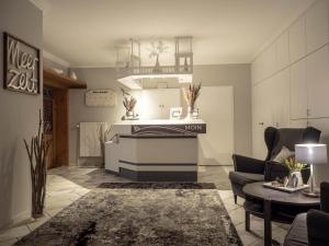 Postel nebo postele na pokoji v ubytování Garni Hotel & Appartements Nordstrand