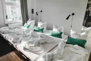 Postel nebo postele na pokoji v ubytování Pyjama Park St Pauli Hotel und Hostel