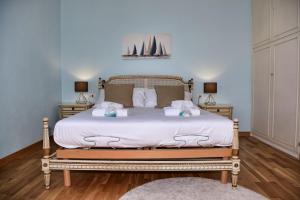 Кровать или кровати в номере Villa Perledina by Wonderful Italy