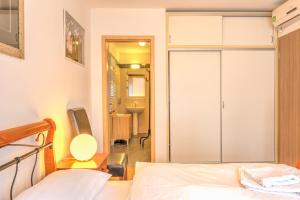 Postel nebo postele na pokoji v ubytování Budapest Center Apartments