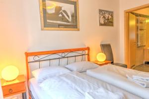 Posteľ alebo postele v izbe v ubytovaní Budapest Center Apartments + 37 fotografií