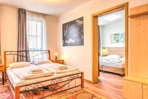 Postel nebo postele na pokoji v ubytování Budapest Center Apartments