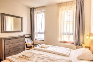 Postel nebo postele na pokoji v ubytování Budapest Center Apartments