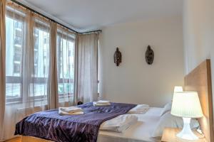 Postel nebo postele na pokoji v ubytování Budapest Center Apartments