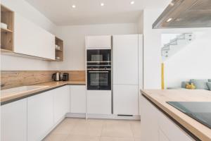 Η κουζίνα ή μικρή κουζίνα στο Colinas - Bentor 3,4 PENTHOUSE POOL VIEW & JACUZZI