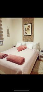 Postel nebo postele na pokoji v ubytování Apartman & SPA Andria