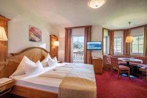 Hotel Maria Theresia客房内的一张或多张床位