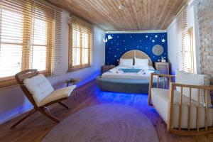 A bed or beds in a room at The Little Prince Boutique Otel