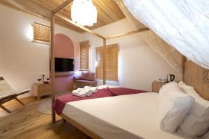 A bed or beds in a room at The Little Prince Boutique Otel