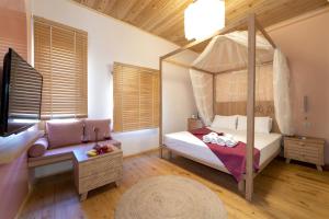 A bed or beds in a room at The Little Prince Boutique Otel