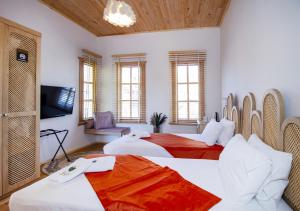 A bed or beds in a room at The Little Prince Boutique Otel