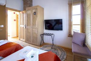 A television and/or entertainment centre at The Little Prince Boutique Otel