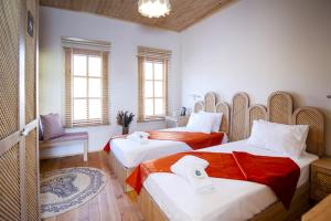 A bed or beds in a room at The Little Prince Boutique Otel