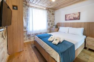 A bed or beds in a room at The Little Prince Boutique Otel