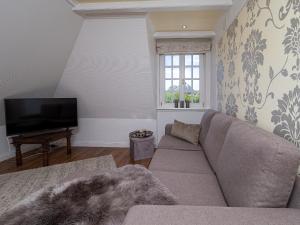 TV a/nebo společenská místnost v ubytování Südwind´s Hummerkoje