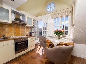 Kuchyň nebo kuchyňský kout v ubytování Südwind´s Hummerkoje