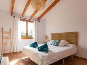 A bed or beds in a room at Marina de namer