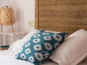 A bed or beds in a room at Marina de namer