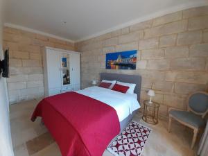 Postel nebo postele na pokoji v ubytování Palazzo Pisani Malta Boutique and SPA + 37 fotografií