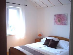 Postel nebo postele na pokoji v ubytování Apartment Sunshine