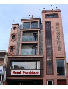 a building with a hotel president on top of it at Hotel President, Jodhpur in Jodhpur