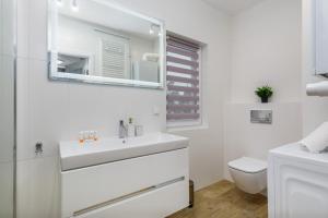 Kúpeľňa v ubytovaní Apartment Rybacka with Parking&Balcony by Noclegi Renters