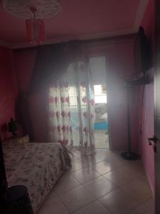 Postel nebo postele na pokoji v ubytování Appartement D8 ARENA MARTIL + 1 fotografie