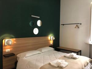 Postel nebo postele na pokoji v ubytování Il Piccolo Albergo Matera