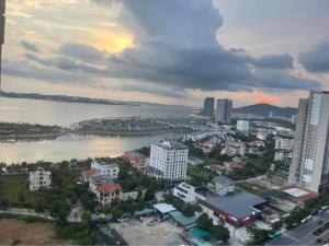 an aerial view of a city with a river and buildings at (Best Seller) Very nice 3 bedroom apartment in Ha Long in Ha Long