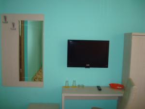 TV a/nebo společenská místnost v ubytování Linda