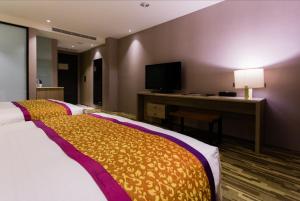 東方明珠國際大飯店房間的床