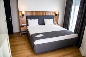 Postel nebo postele na pokoji v ubytování Silvana Hotel