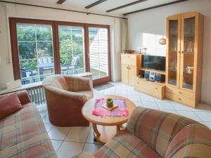 TV a/nebo společenská místnost v ubytování Ferienhaus Hübner, FeWo Vermittlung Nordsee