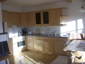 Kuchyň nebo kuchyňský kout v ubytování Ferienwohnung Obernauer