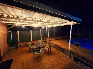 Patio nebo venkovní prostory v ubytování Wilgespruit Manor Flat