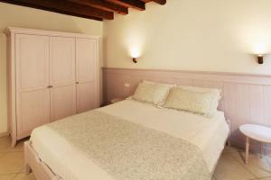 A bed or beds in a room at Ca' de l'Anzolo