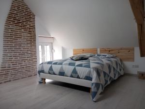 Posteľ alebo postele v izbe v ubytovaní L'OASIS - Maison rénovée à 10 min de Beauval