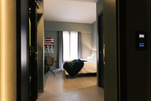 TV o dispositivi per l'intrattenimento presso Arryvo Hotel