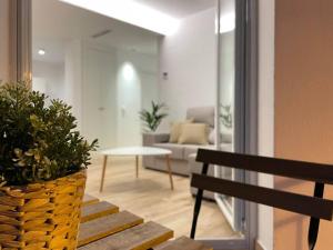 Posedenie v ubytovaní Apartamento nuevo céntrico frente al mar en Palamós