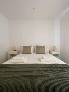 Posteľ alebo postele v izbe v ubytovaní Apartamento nuevo céntrico frente al mar en Palamós