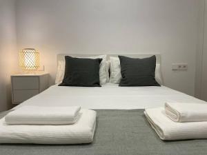 Posteľ alebo postele v izbe v ubytovaní Apartamento nuevo céntrico frente al mar en Palamós