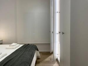 Posteľ alebo postele v izbe v ubytovaní Apartamento nuevo céntrico frente al mar en Palamós