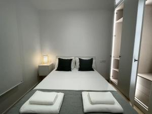 Posteľ alebo postele v izbe v ubytovaní Apartamento nuevo céntrico frente al mar en Palamós