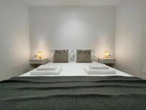 Posteľ alebo postele v izbe v ubytovaní Apartamento nuevo céntrico frente al mar en Palamós