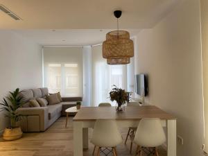 Posedenie v ubytovaní Apartamento nuevo céntrico frente al mar en Palamós