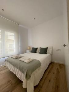Posteľ alebo postele v izbe v ubytovaní Apartamento nuevo céntrico frente al mar en Palamós